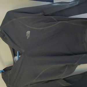 Gray fitted long sleeve pullover.